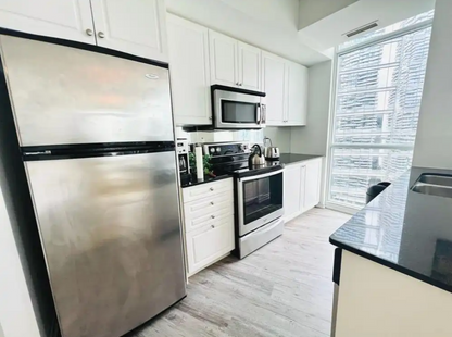 High-End Furnished Condo in Maple Leaf Square — City Views & Luxury Amenities