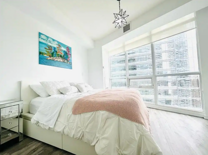 High-End Furnished Condo in Maple Leaf Square — City Views & Luxury Amenities